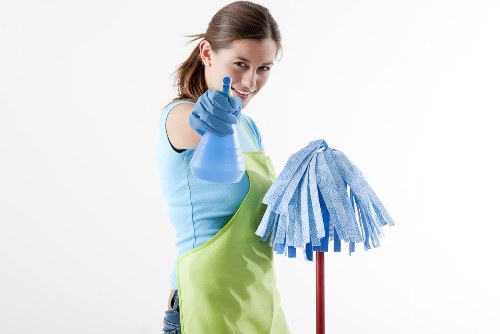 Professional office cleaning in a modern workspace lobby