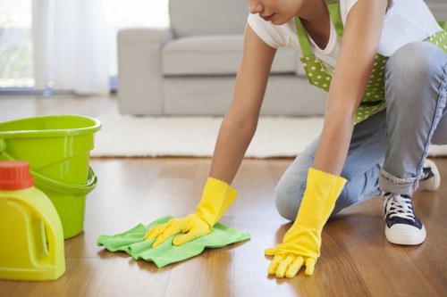 Detailed post-construction cleaning of surfaces and fixtures